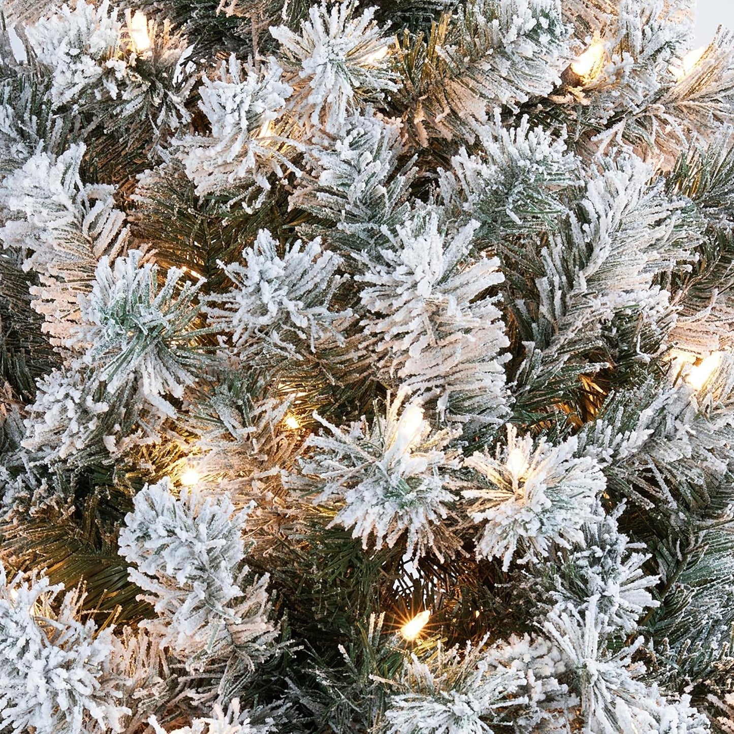 Transform your holiday season with our stunning 4.5Ft Snow Flocked Pre-Lit Christmas Tree! 🎄✨ Featuring 150 warm white incandescent lights and 340 lush branch tips, it's the perfect centerpiece for your festive celebrations! #ChristmasTree #HolidayDecor