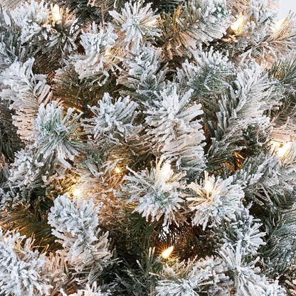 Transform your holiday season with our stunning 4.5Ft Snow Flocked Pre-Lit Christmas Tree! 🎄✨ Featuring 150 warm white incandescent lights and 340 lush branch tips, it's the perfect centerpiece for your festive celebrations! #ChristmasTree #HolidayDecor